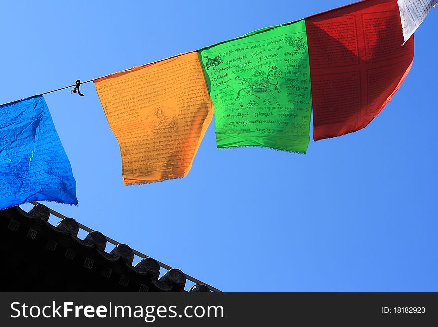 Prayer flags on blue sky background