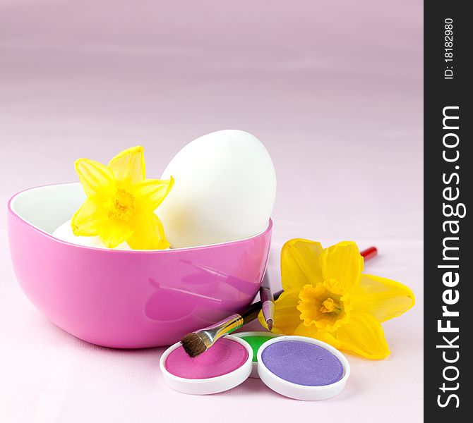 White eggs, colors and paintbrush for easter. White eggs, colors and paintbrush for easter