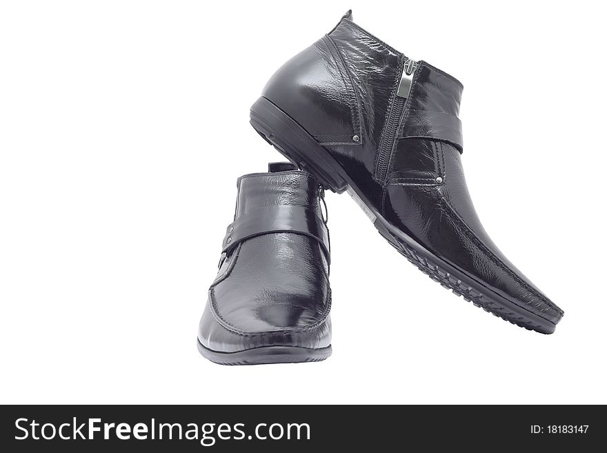Black men's shoes on a white background