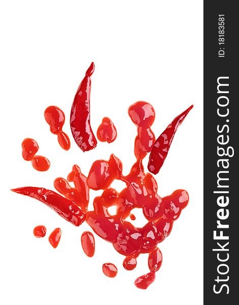 Red chili pepper and sauce isolated over white