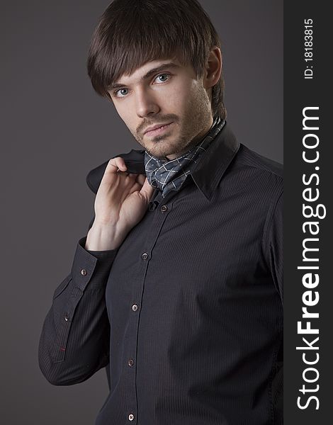 Portrait of fashion male over grey background. Portrait of fashion male over grey background