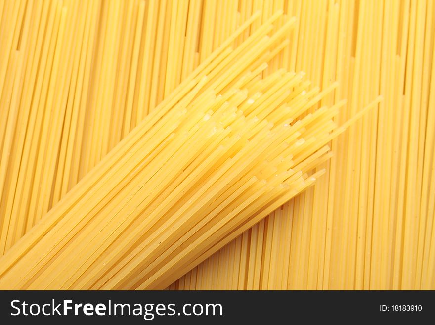 A bunch of spaghetti, uncooked spaghetti noodles