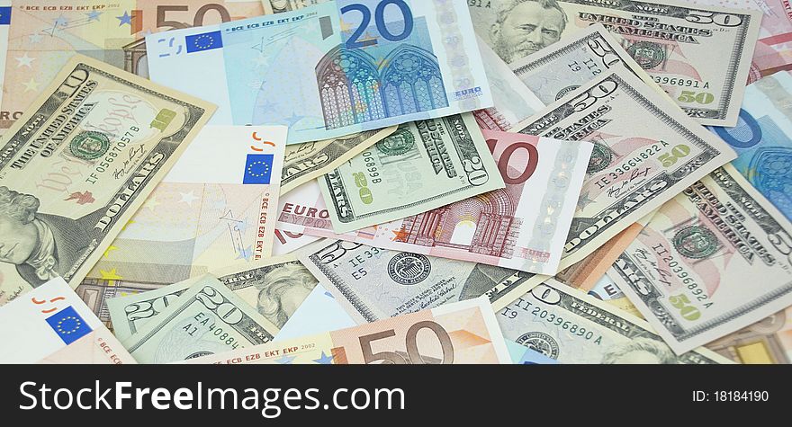 Heap of euro and dollar banknotes, money background. Heap of euro and dollar banknotes, money background