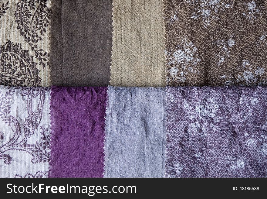 Many kind of fabric in violet and brown shade. Many kind of fabric in violet and brown shade.