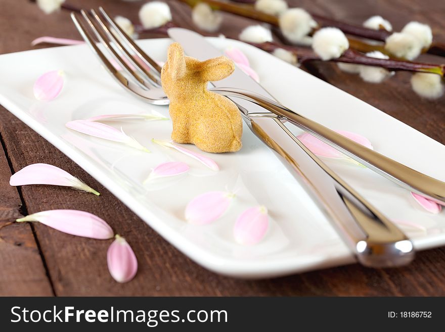 Easter place setting with petals and willow