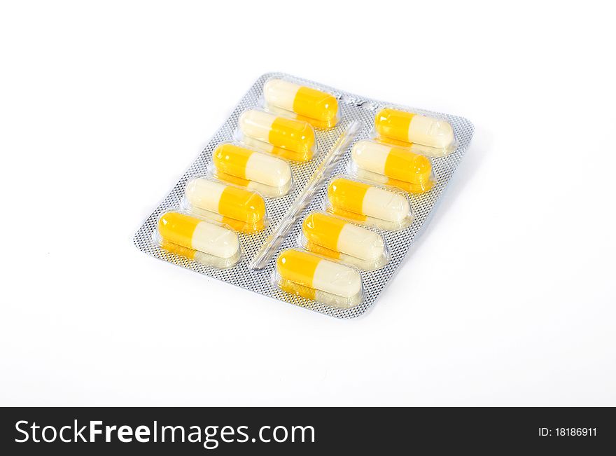 Capsules of medicine in blister isolated. Capsules of medicine in blister isolated.