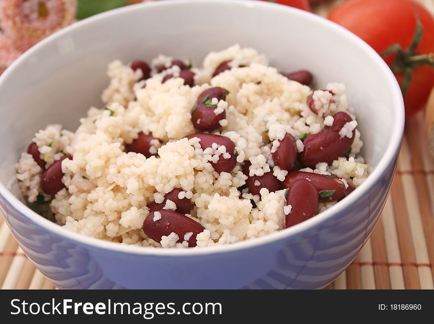 A fresh salad of beans with couscous