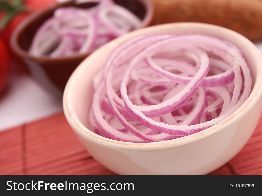 Some fresh red onion rings. Some fresh red onion rings