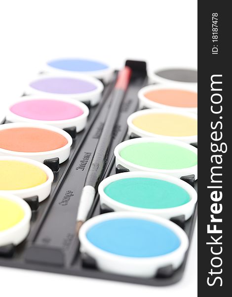 Colors on a palette isolated on white selective focus. Colors on a palette isolated on white selective focus