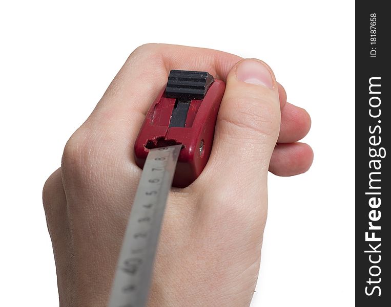 A tape measure on a hand .