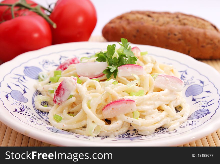 A fresh salad of noodles with radish