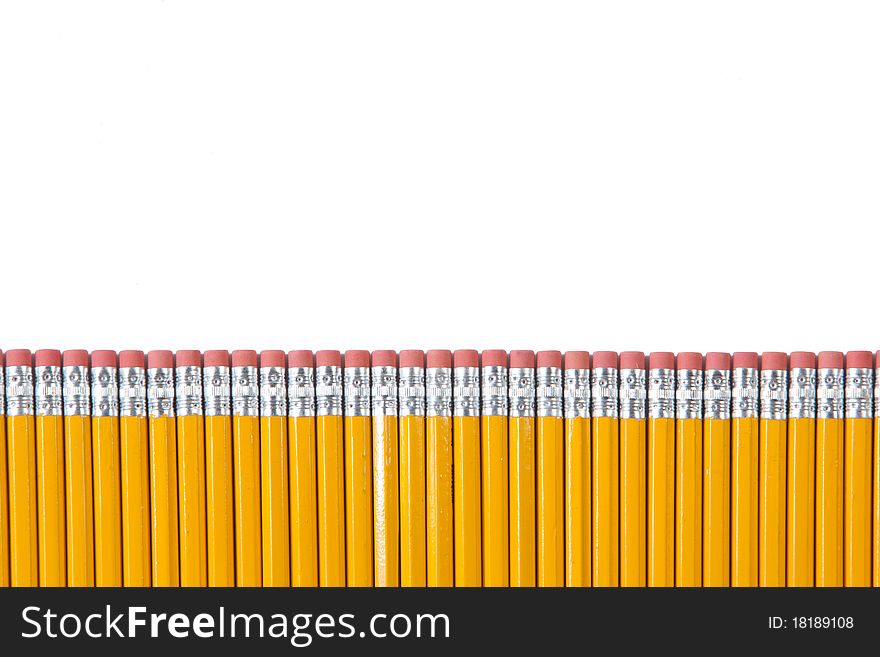 A row of pencils isolated on white