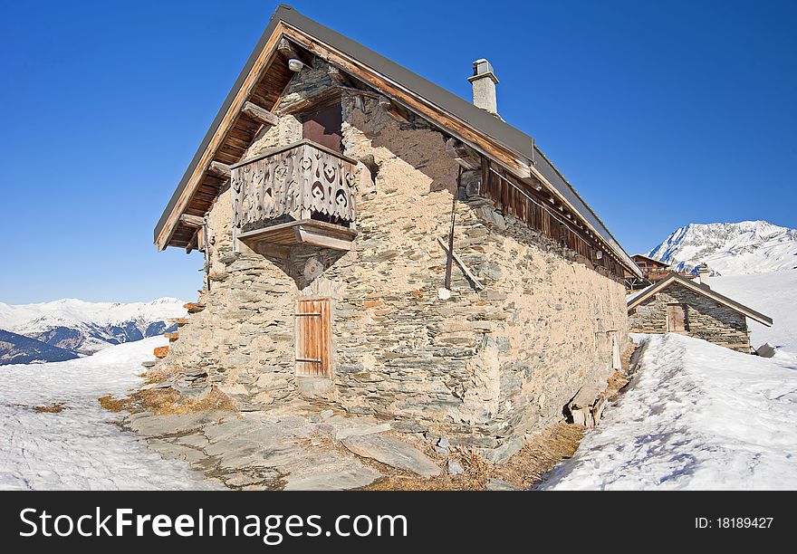 Traditional alpine hut on a mountain