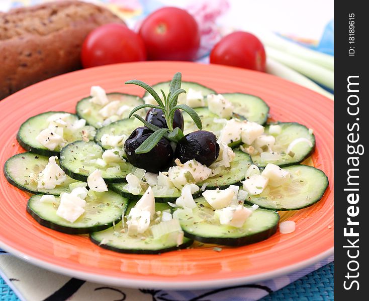 Salad of cucumber on a plate. Salad of cucumber on a plate