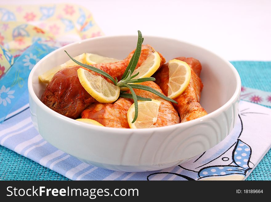 Some fresh meat of chicken with lemon. Some fresh meat of chicken with lemon