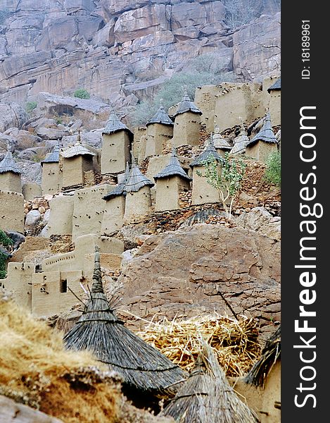 Dogon granaries in a village along the base of the Bandiagara escarpment. Dogon granaries in a village along the base of the Bandiagara escarpment