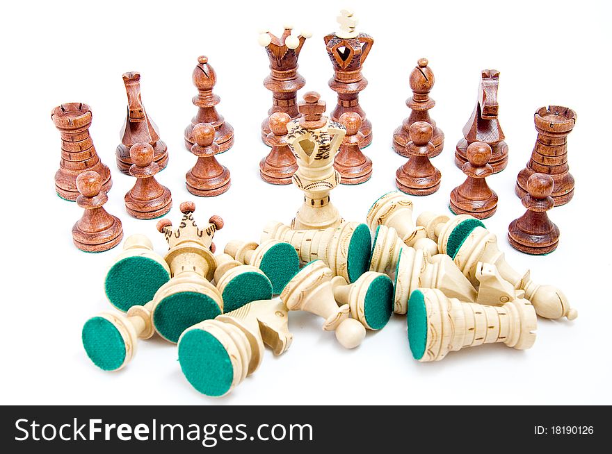 Defeat - last one standing, chess figures on white background