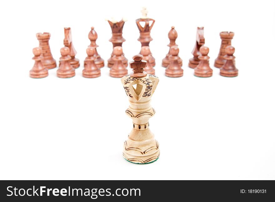 Alone against everyone, chess King against opposite army on white background