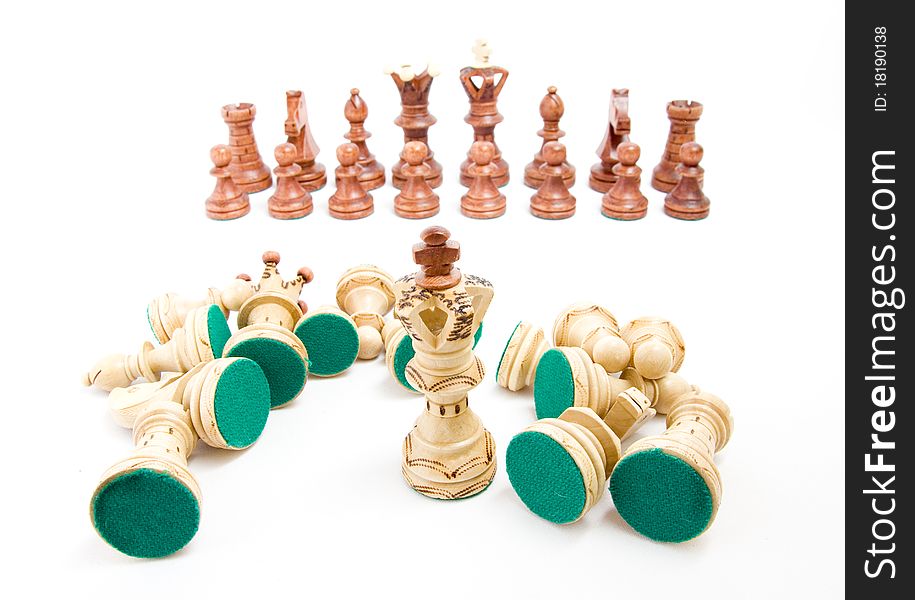 Defeat and surrounding concept, chess figures on white background. Defeat and surrounding concept, chess figures on white background