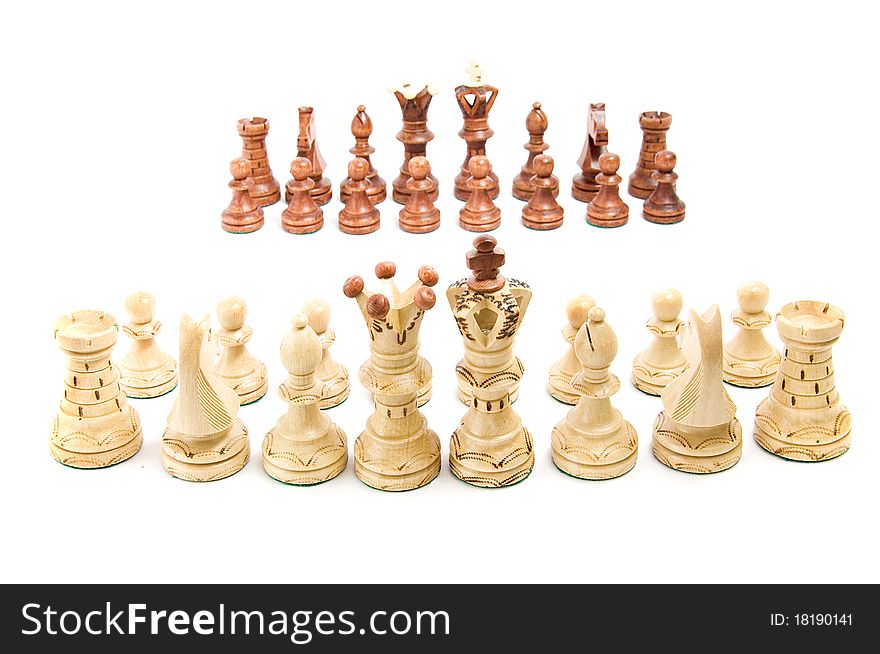 Chess figures against each other, on white background