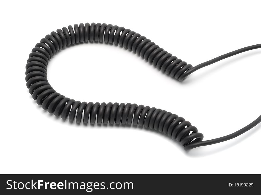 Black telephone cord in the form of a spring. On a white background. Black telephone cord in the form of a spring. On a white background