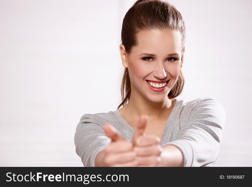 Portrait of beautiful woman isolated on white, showing thumbs up. Portrait of beautiful woman isolated on white, showing thumbs up