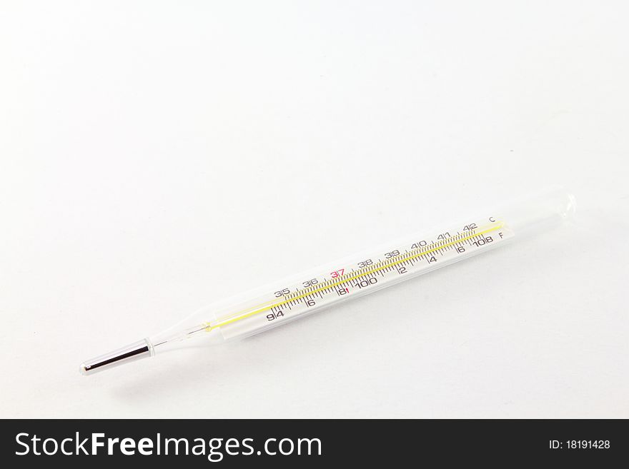 Clinical thermometer with shallow depth of field on white