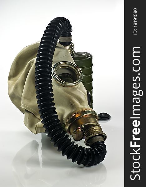 Old military gas mask on white background