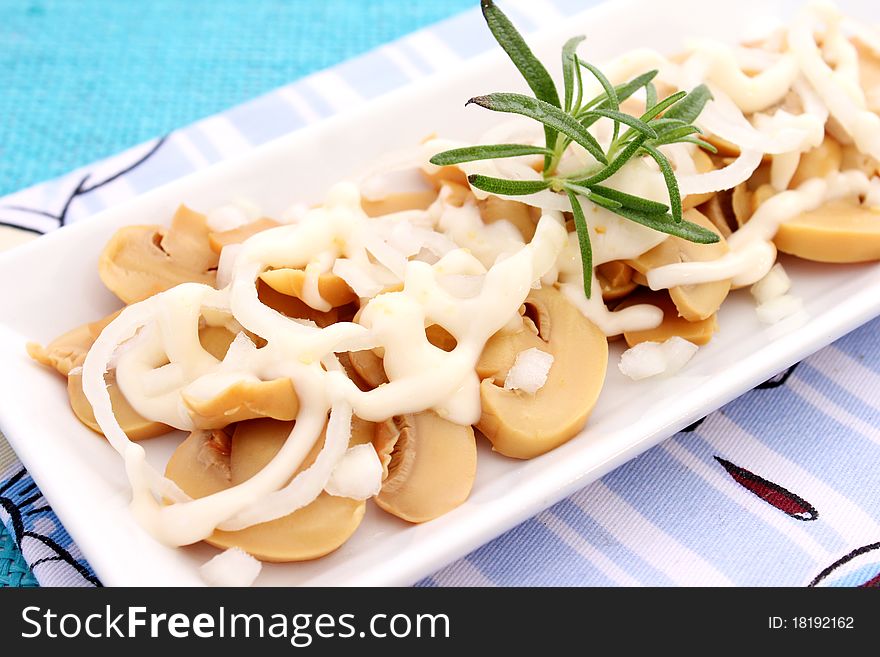 A fresh salad of mushrooms on a plate