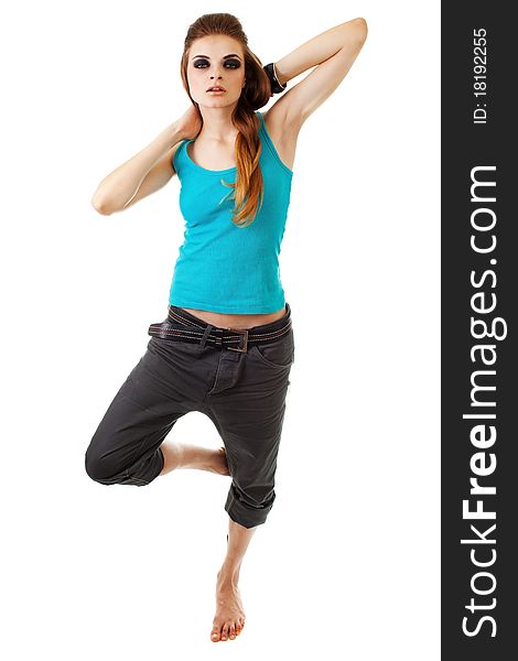 Girl in a dark makeup in blue T-shirt on white background