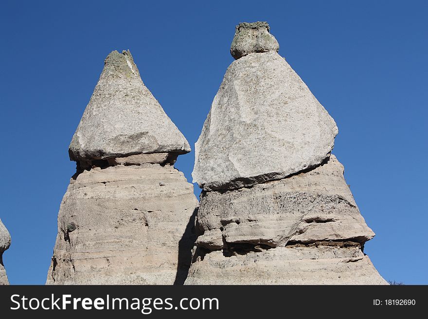 Two Peaks stand out at Kasha-Katuwe Tent Rocks National Monument, New Mexico. Two Peaks stand out at Kasha-Katuwe Tent Rocks National Monument, New Mexico