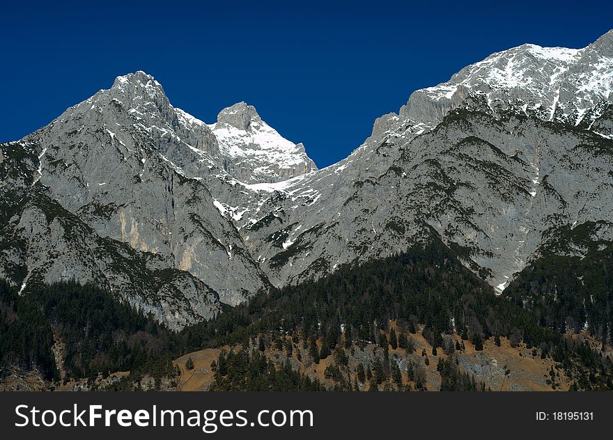 Cloudless sky over the tyrolean alps