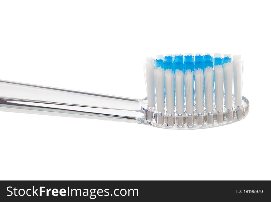 New toothbrush close-up on a white background