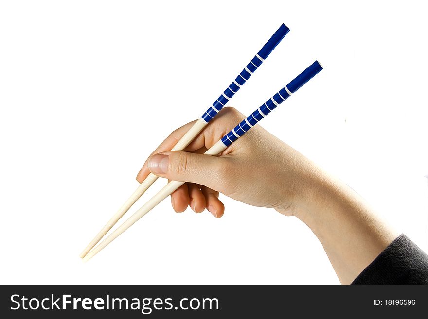 Woman hand with chopsticks isolated on white background