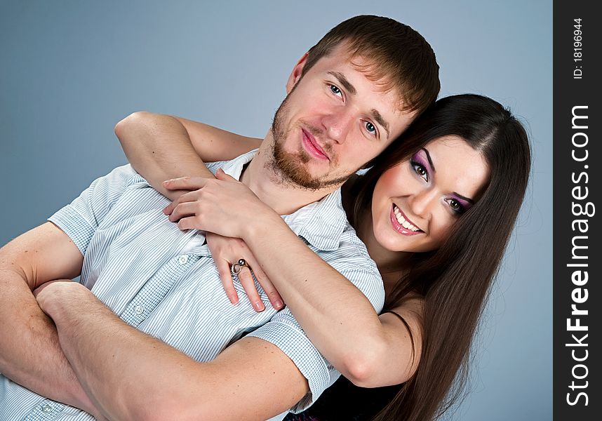 Young couple over white background