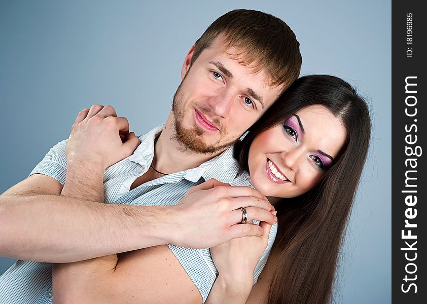 Young couple over white background