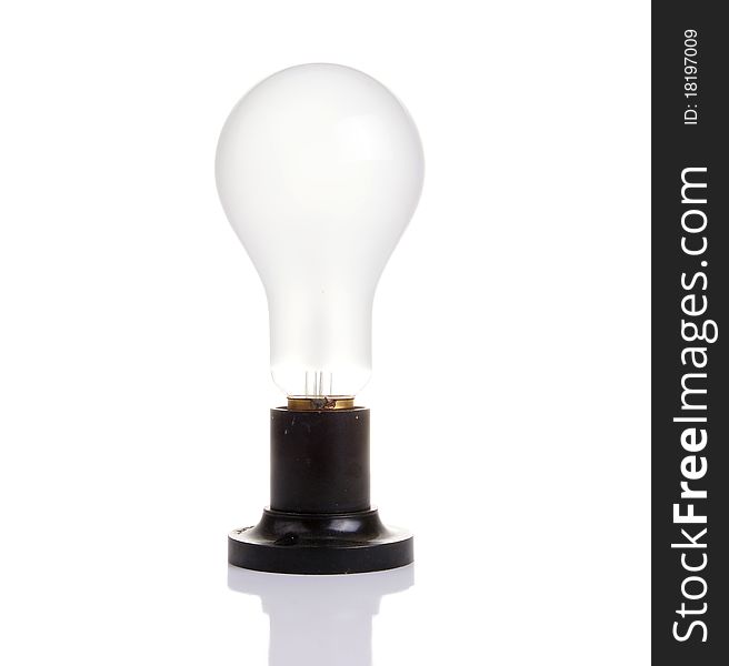 Large brushed electric incandescent lamp with a white background