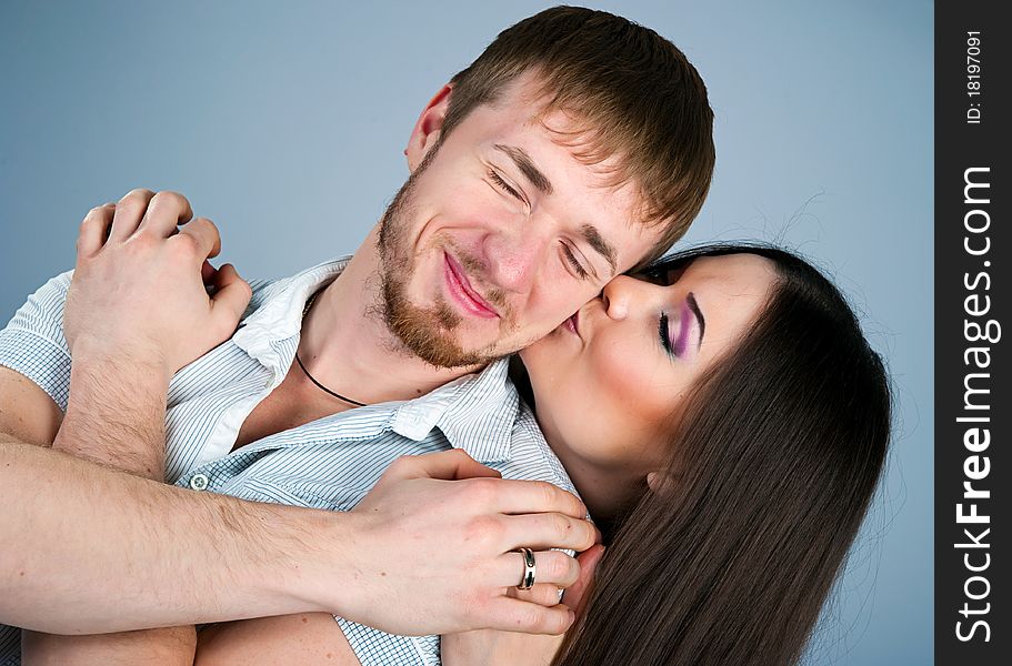 Young couple over white background