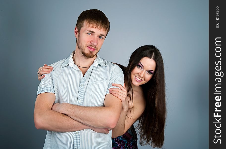 Young couple over white background