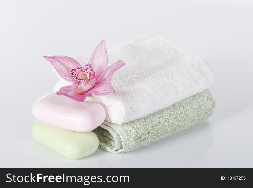 Spa concept still life with orchid over white background