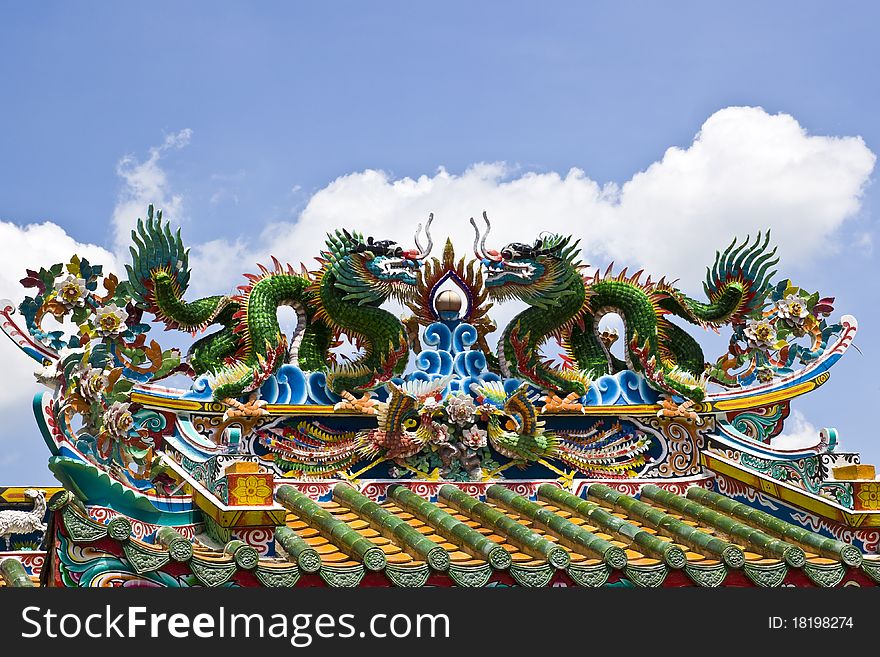 Statue dragon in Chinese style on The roof. Statue dragon in Chinese style on The roof