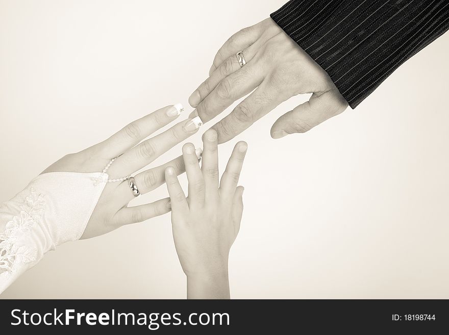 Bride and Groom baby Hands with Wedding Ring