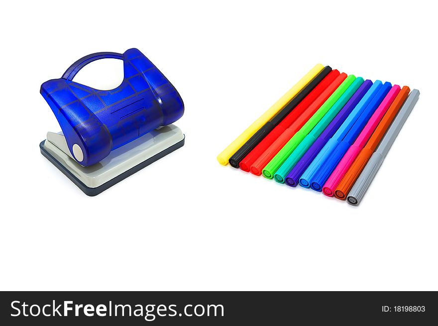 Photo of the Hole puncher and soft-tip pens on white background