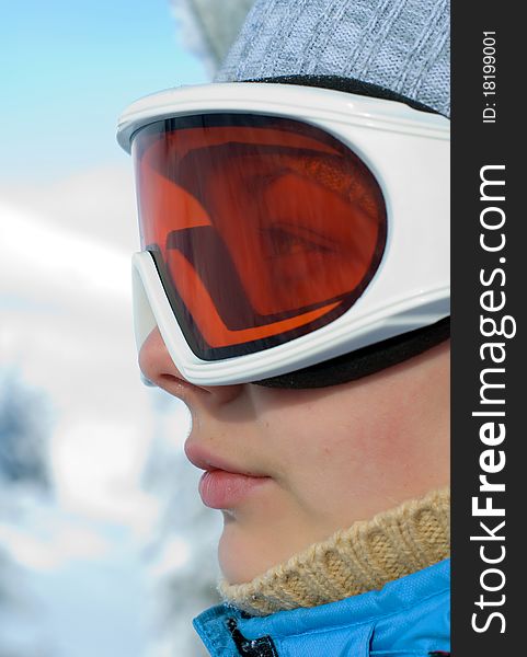 Young woman face in ski mask