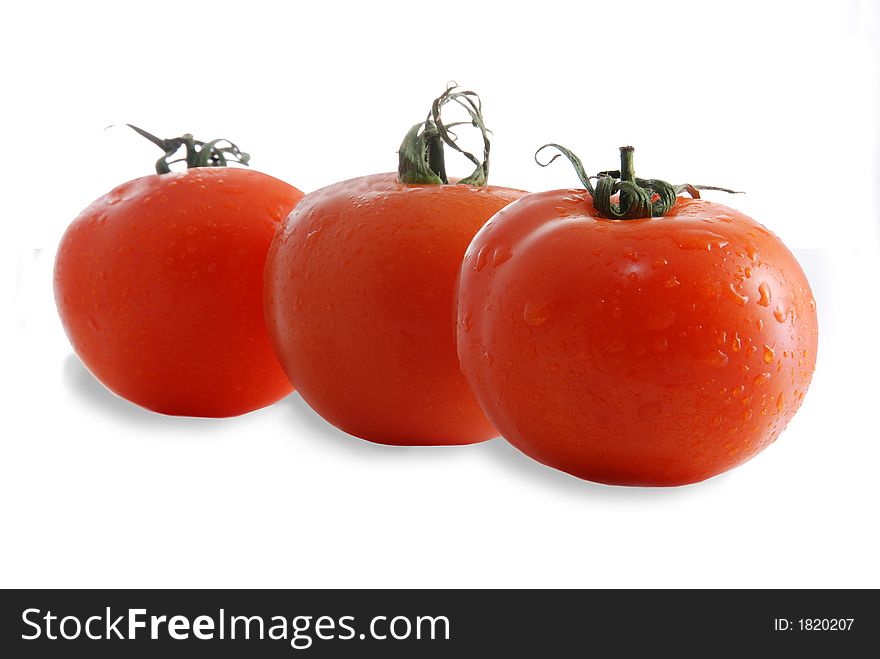 Tasty, fresh tomatoes isolated against white background. Tasty, fresh tomatoes isolated against white background