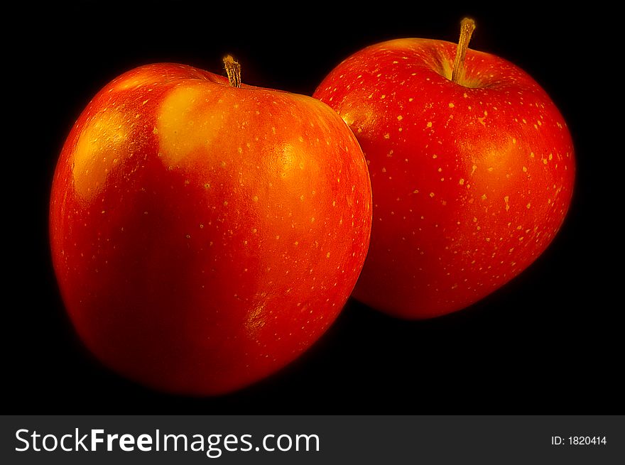 Two Red Apples On Black