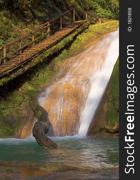 Waterfall, Stairs And Large Beam