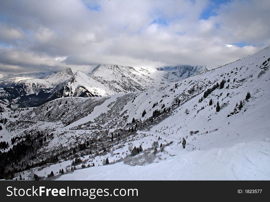 Winter sunny mountains peaks in France. Winter sunny mountains peaks in France