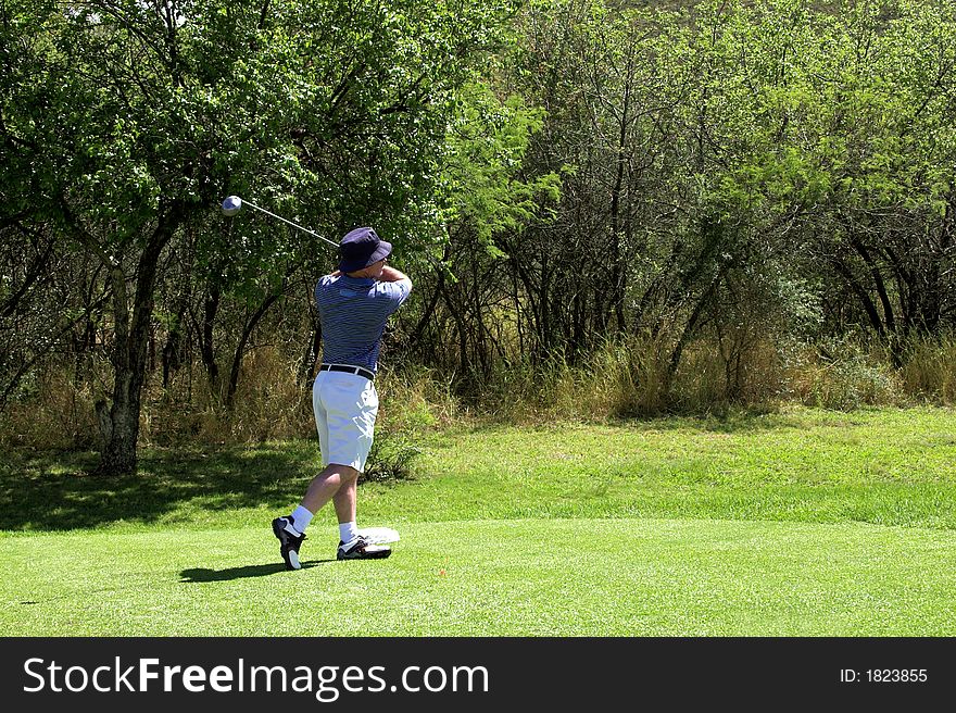 Golfer On The Tee Box.