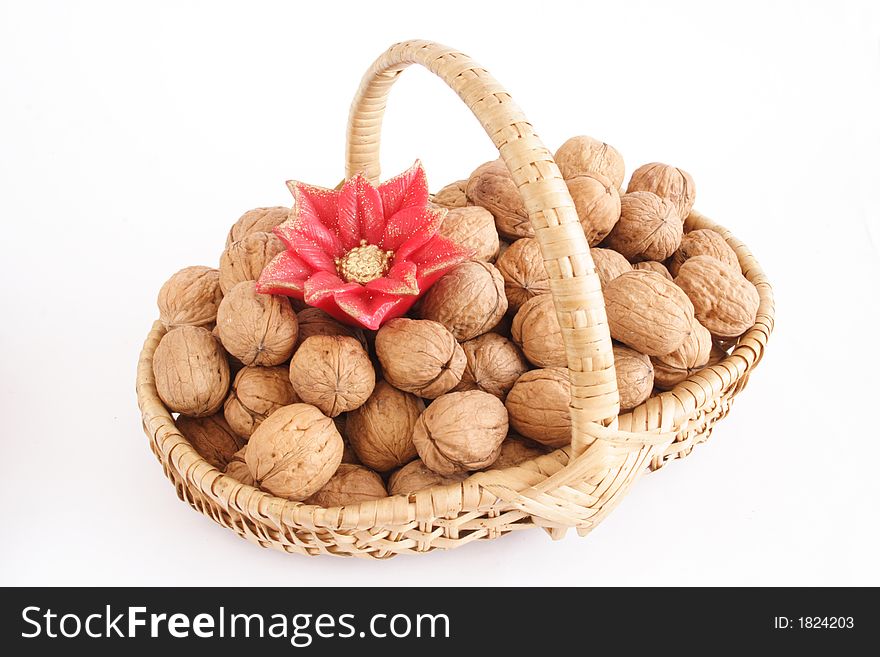Basket of walnuts and wax flower